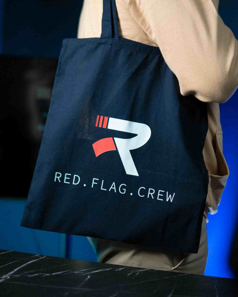 Red Flag Bag displaying minimalist motorsport design in navy color.