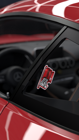 Red Flag Sticker on car window, symbolizing motorsport passion, laminated for durability.