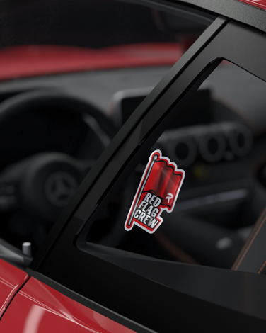Red Flag Sticker on car window, symbolizing motorsport passion, laminated for durability.